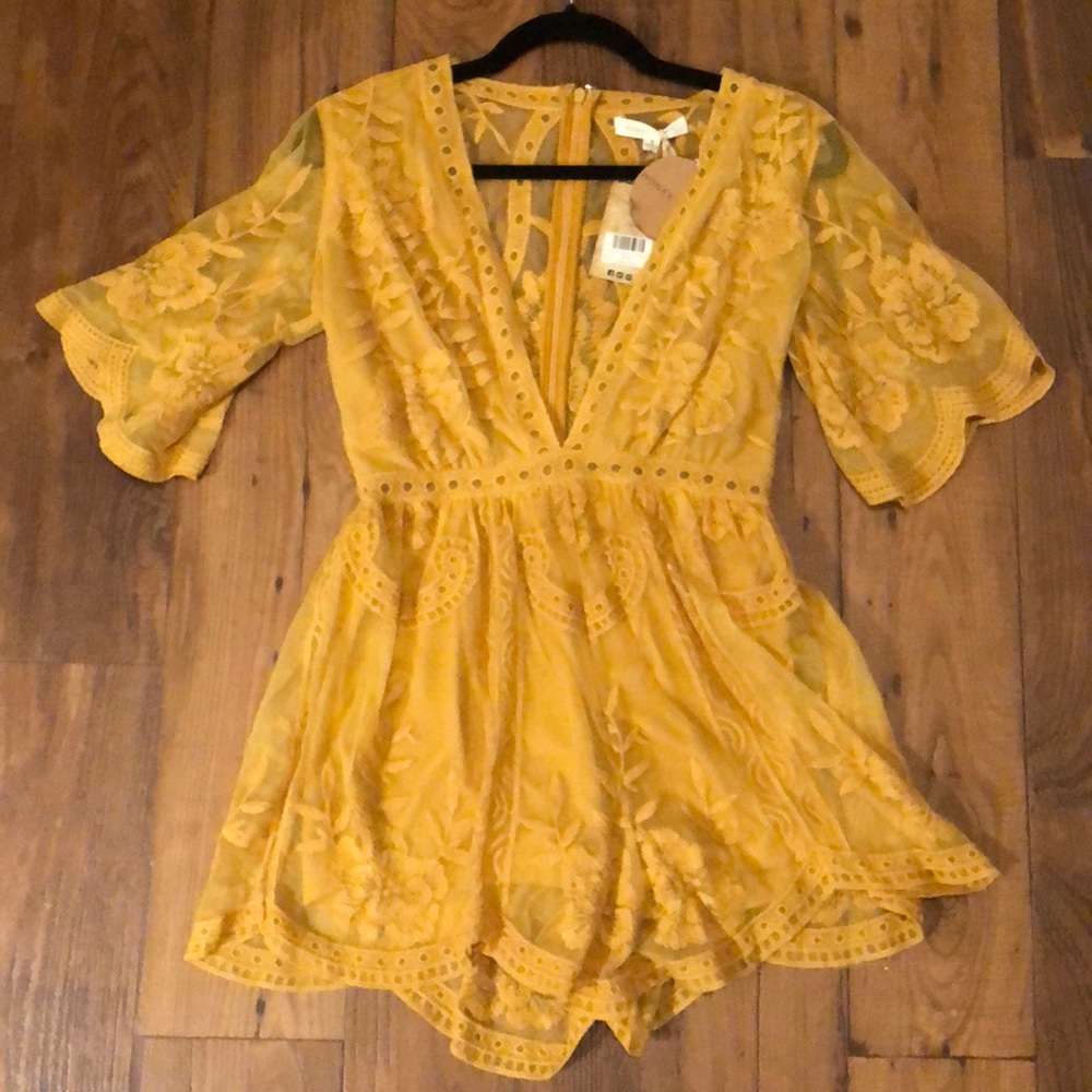 Honey Punch mustard yellow deep v lace romper!